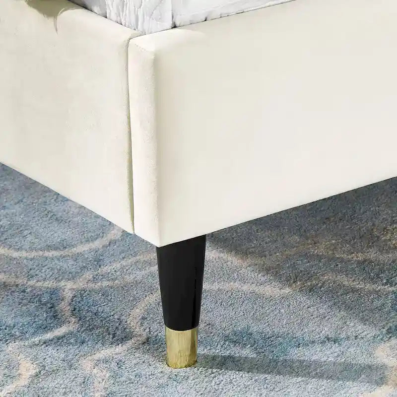 Lit plateforme avec tête de lit capitonnée en velours