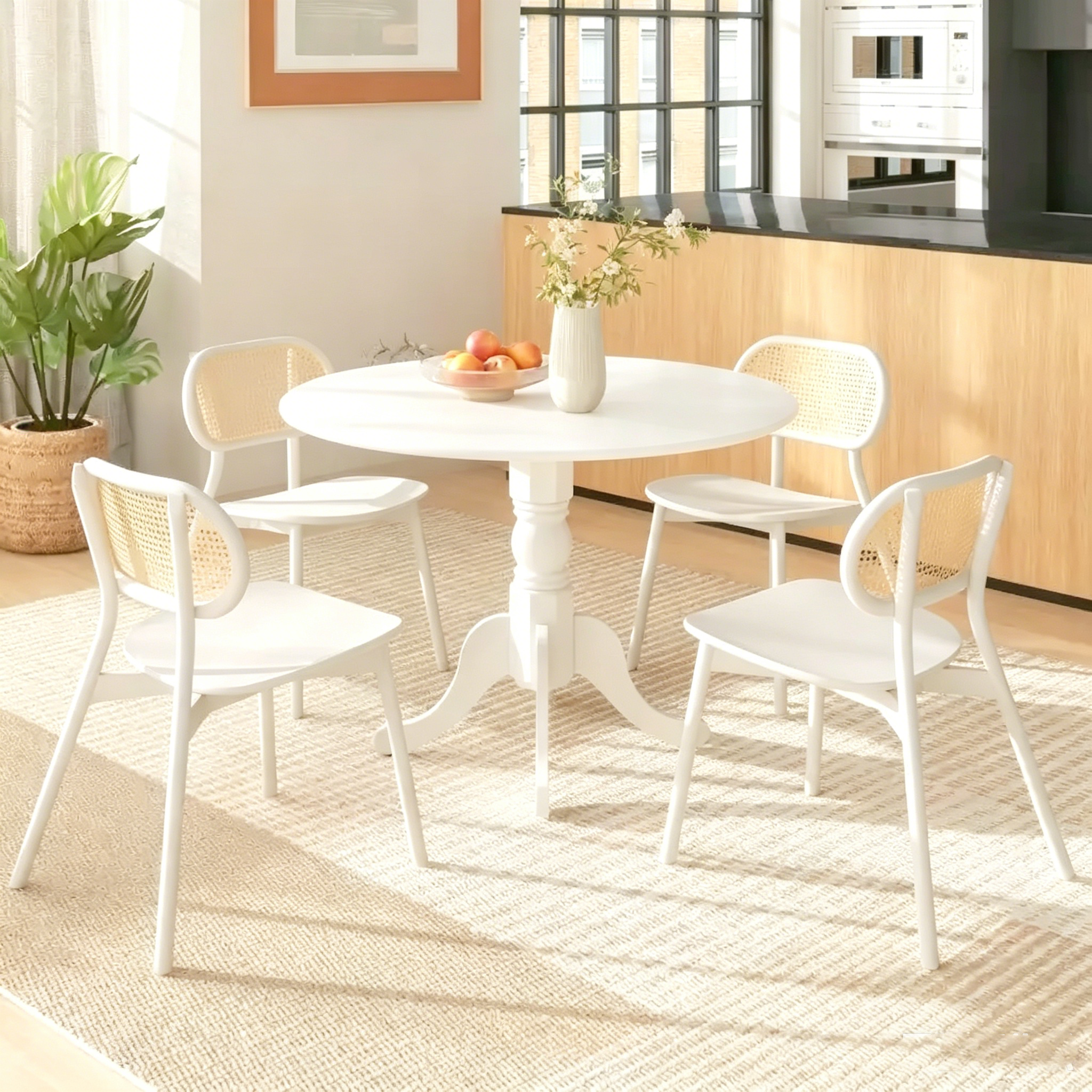 Table de salle à manger en bois avec plateau rond et pieds en tréteaux incurvés